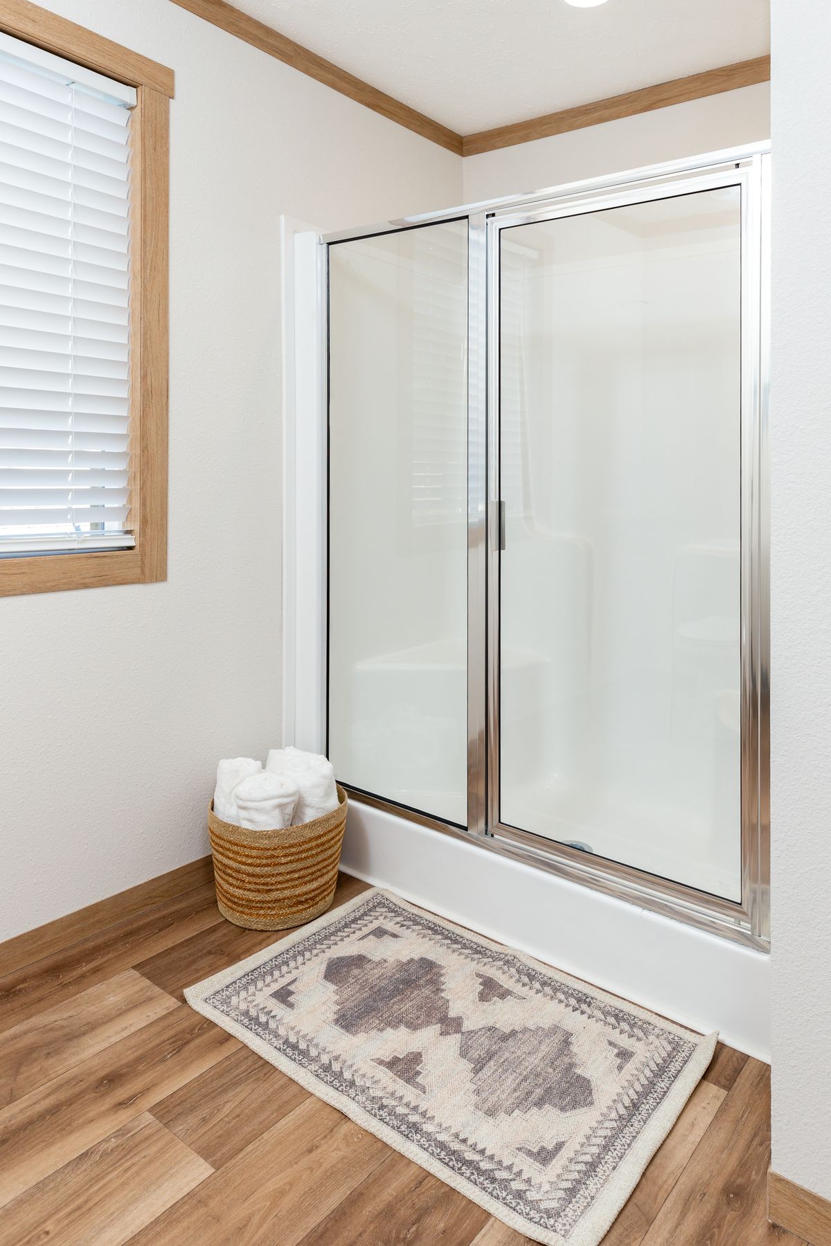 The WILDER Primary Bathroom. This Manufactured Mobile Home features 3 bedrooms and 2 baths.