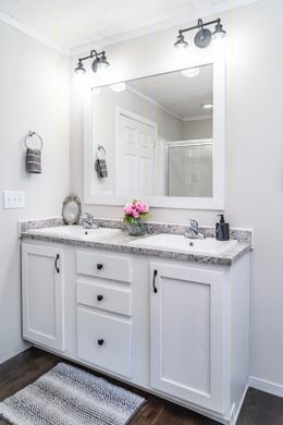 The TUCSON Primary Bathroom. This Manufactured Mobile Home features 3 bedrooms and 2 baths.