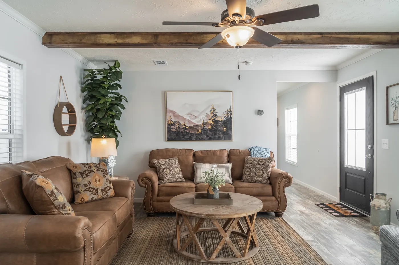 The THE MERCER Living Room. This Manufactured Mobile Home features 3 bedrooms and 2 baths.