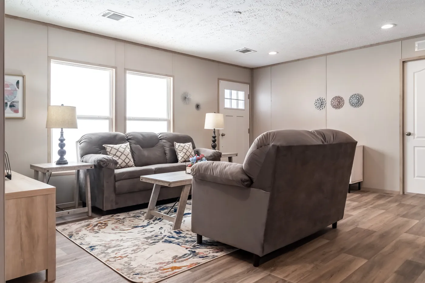 The DESOTO Living Room. This Manufactured Mobile Home features 3 bedrooms and 2 baths.