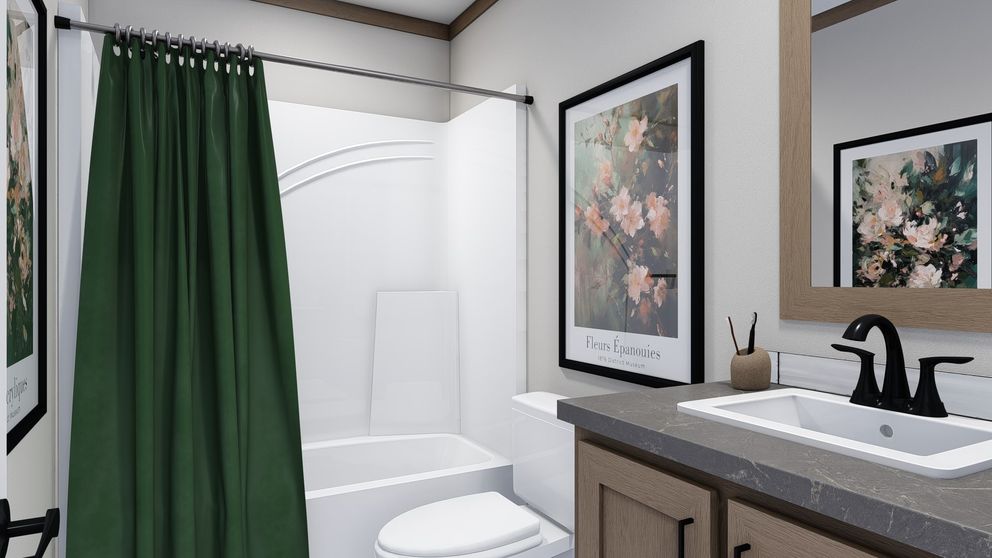 The TRINITY 60 Guest Bathroom. This Manufactured Mobile Home features 2 bedrooms and 2 baths.