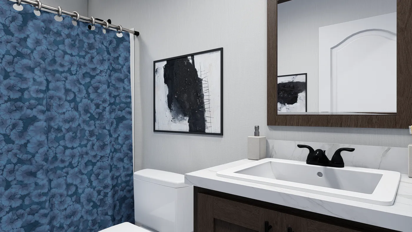 The BOLT Guest Bathroom. This Manufactured Mobile Home features 4 bedrooms and 2 baths.