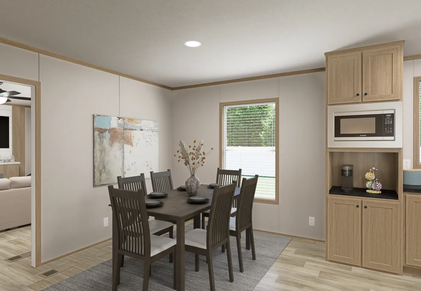 The THE MOUNTAINEER 72 Dining Area. This Manufactured Mobile Home features 3 bedrooms and 2 baths.