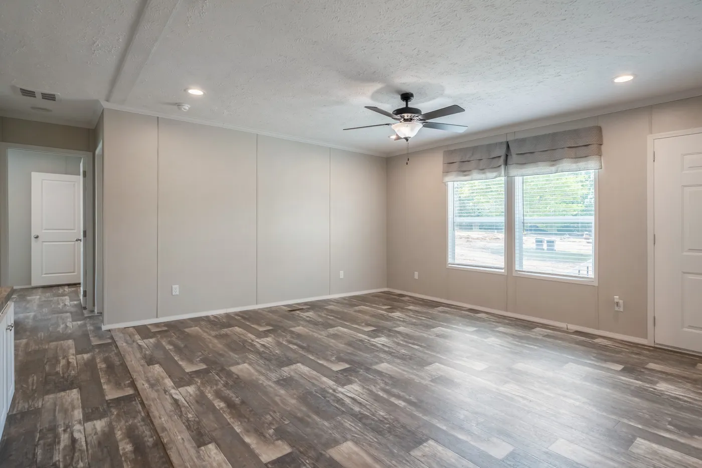 The NORTHSHORE Living Room. This Manufactured Mobile Home features 3 bedrooms and 2 baths.