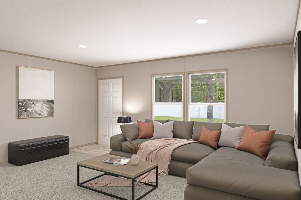 The THE EAGLE 68 Living Room. This Manufactured Mobile Home features 4 bedrooms and 2 baths.