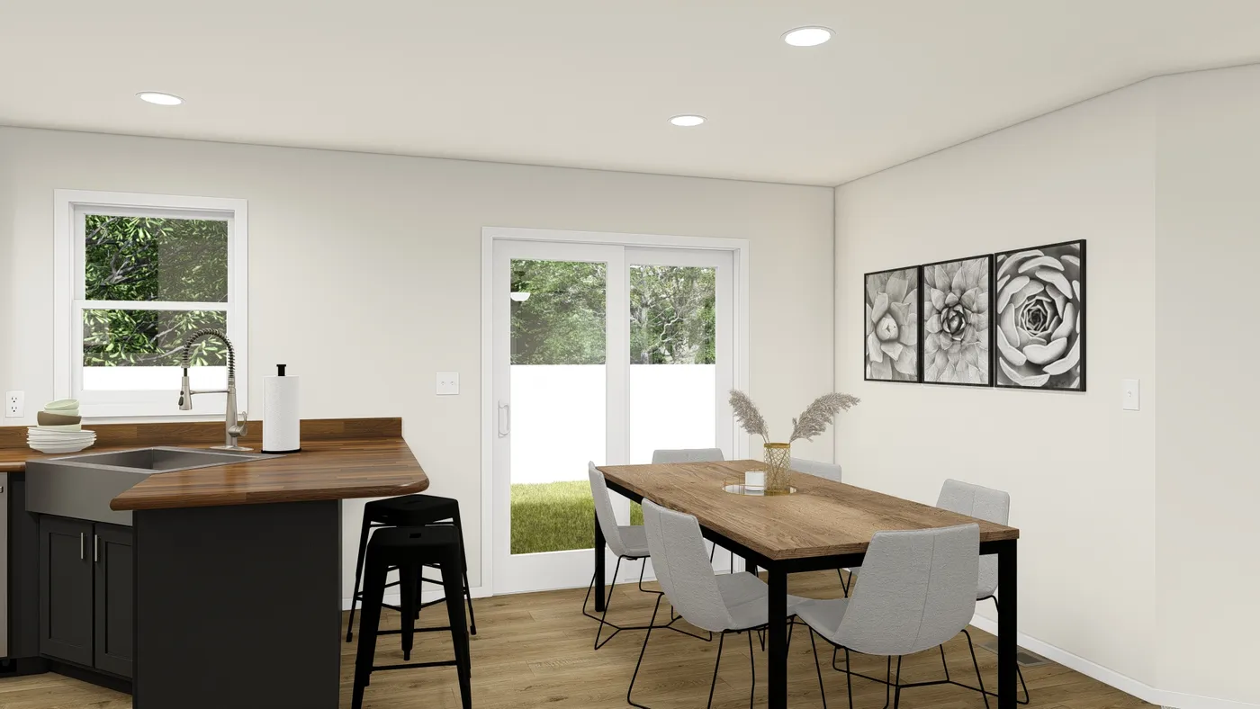 The DRM483F 48'              DREAM Dining Area. This Manufactured Mobile Home features 3 bedrooms and 2 baths.