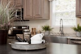 The KENNESAW ELITE Kitchen. This Manufactured Mobile Home features 4 bedrooms and 2 baths.