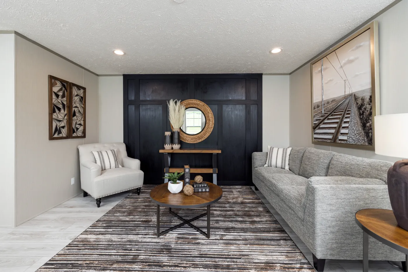 The SHOWER HOUSE Living Room. This Manufactured Mobile Home features 3 bedrooms and 2 baths.