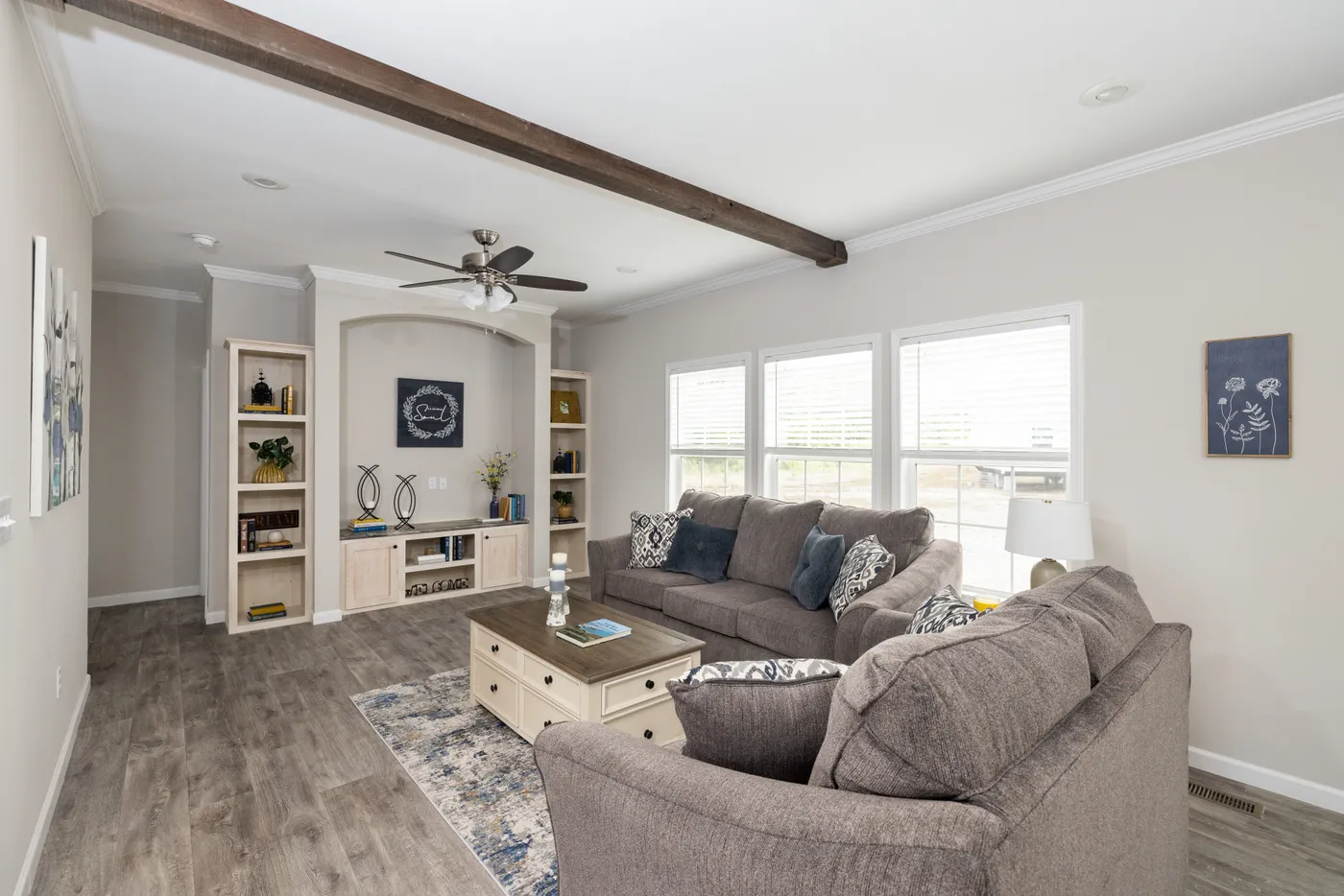 The THE ROGUE Living Room. This Manufactured Mobile Home features 3 bedrooms and 2 baths.