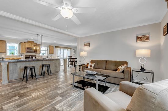 The MIFFLIN 6028-942 Living Room. This Manufactured Mobile Home features 3 bedrooms and 2 baths.