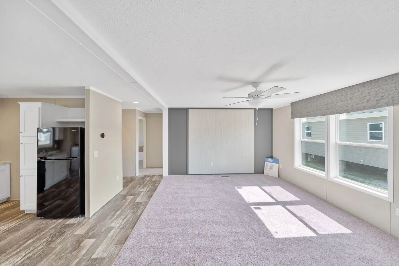 The ZIRCON Living Room. This Manufactured Mobile Home features 3 bedrooms and 2 baths.