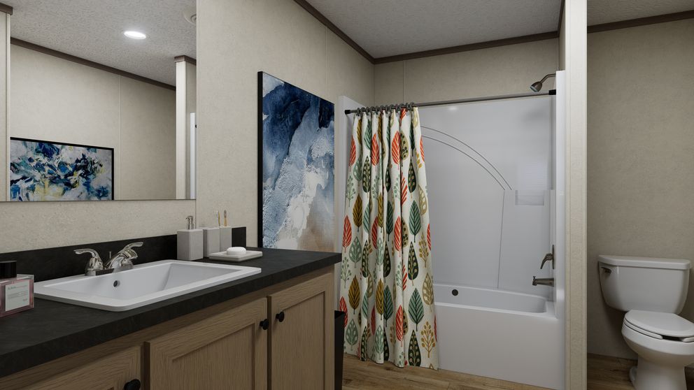 The 5224-CC55 STONEBRIDGE 52 Primary Bathroom. This Manufactured Mobile Home features 3 bedrooms and 2 baths.