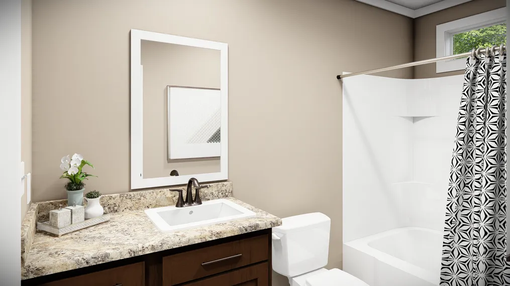 The THE LLOYD II Guest Bathroom. This Manufactured Mobile Home features 3 bedrooms and 2 baths.