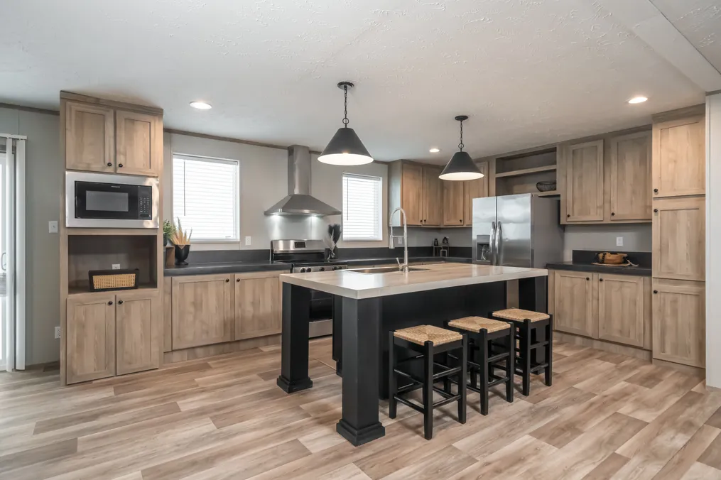 The TRADITION 72 Kitchen. This Manufactured Mobile Home features 4 bedrooms and 2 baths.