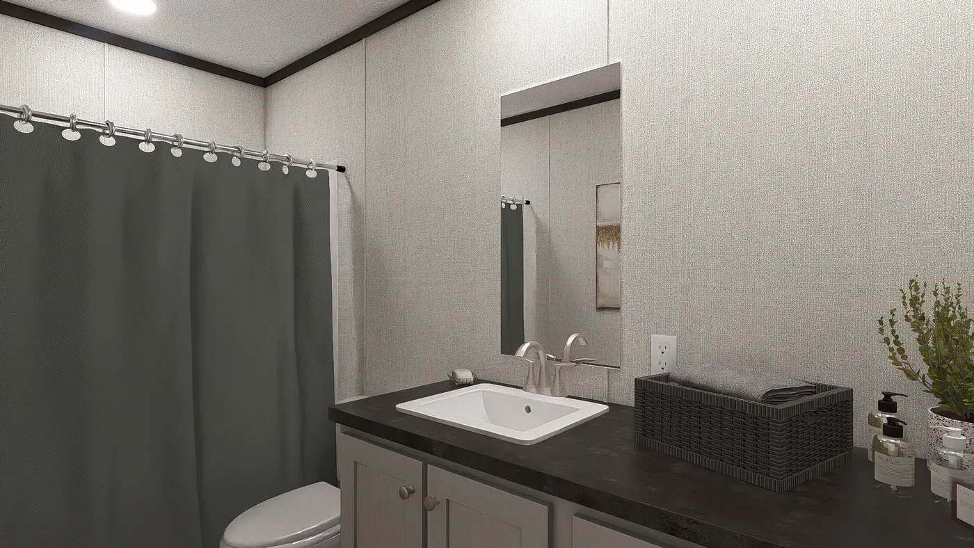 The DISCOVER Guest Bathroom. This Manufactured Mobile Home features 3 bedrooms and 2 baths.