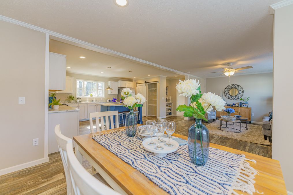 The SWEET BREEZE 72 Living Room. This Manufactured Mobile Home features 4 bedrooms and 2 baths.