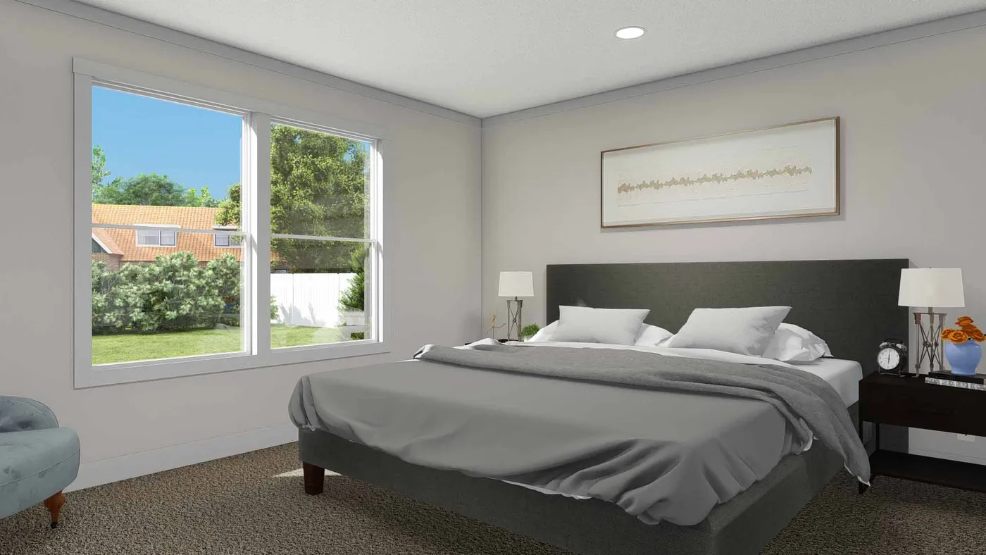 The ROCKET MAN Primary Bedroom. This Manufactured Mobile Home features 3 bedrooms and 2 baths.