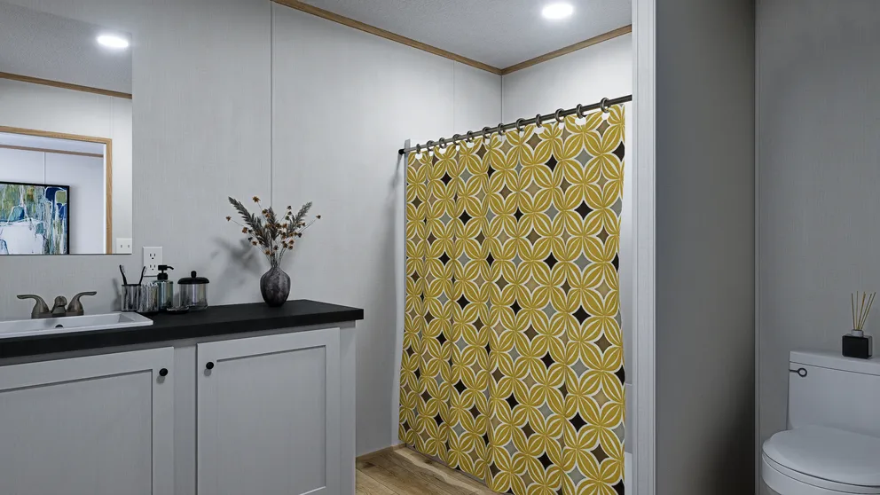 The EMBER Primary Bathroom. This Manufactured Mobile Home features 2 bedrooms and 2 baths.