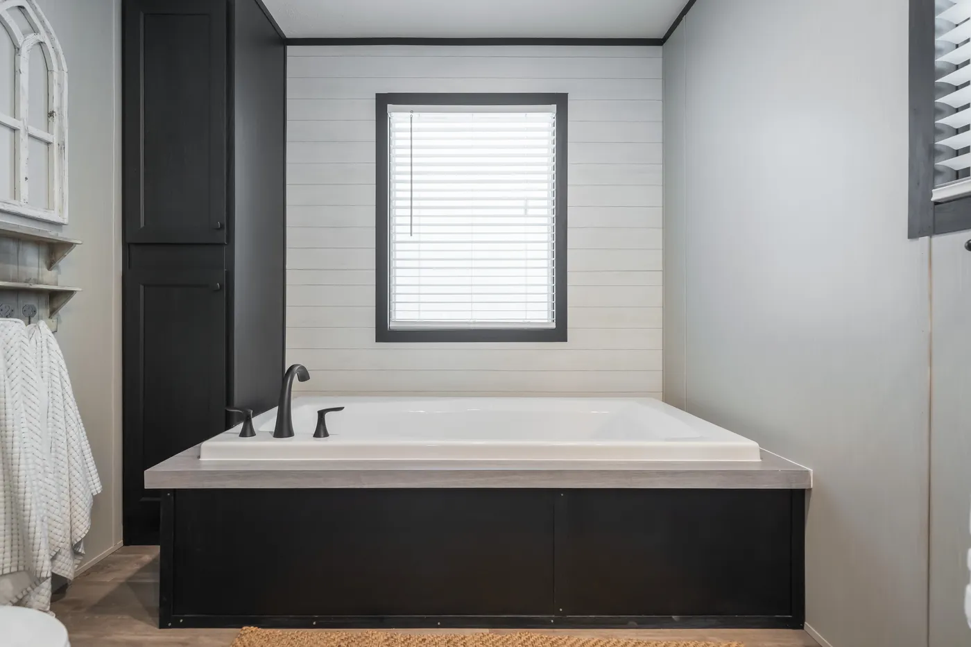 The CRAZY EIGHTS Primary Bathroom. This Manufactured Mobile Home features 4 bedrooms and 2 baths.