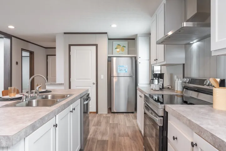 The EMPOWER Kitchen. This Manufactured Mobile Home features 4 bedrooms and 2 baths.
