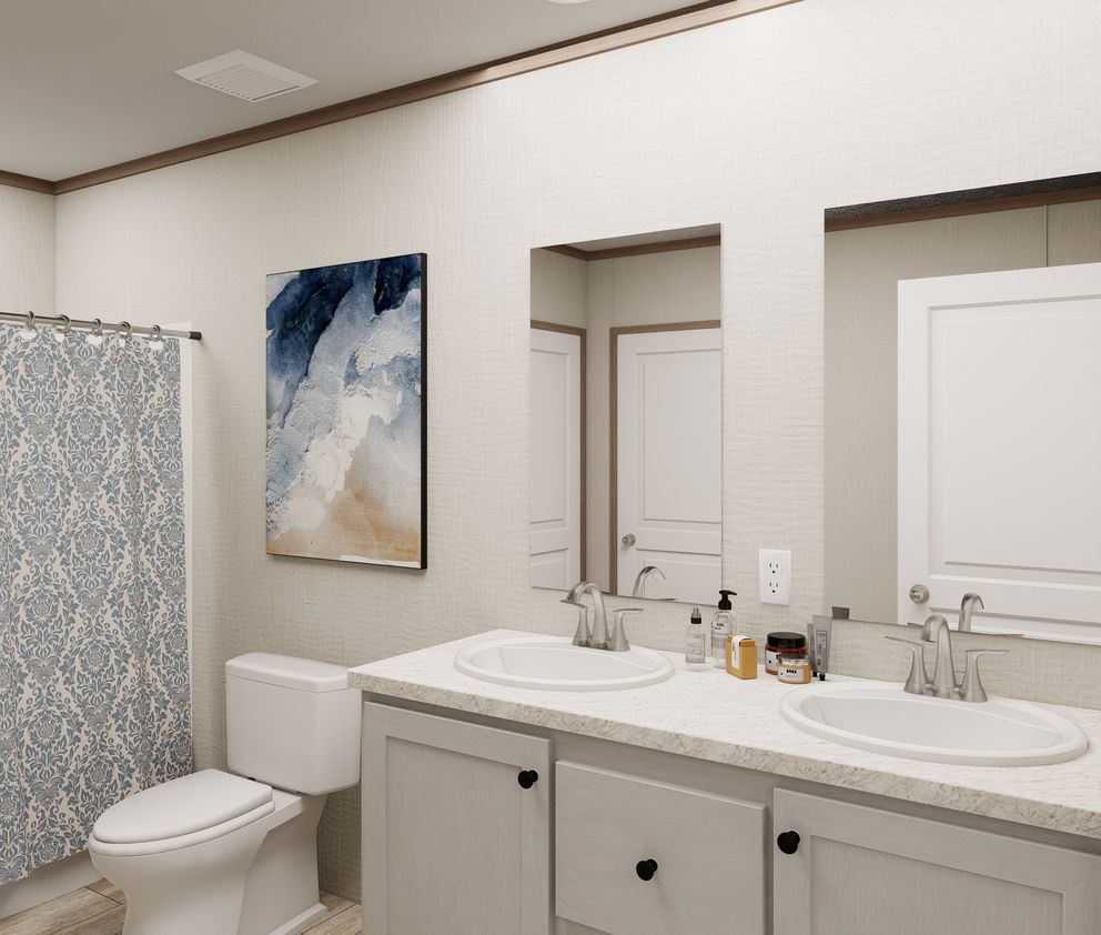 The ULTRA FLEX 60 Primary Bathroom. This Manufactured Mobile Home features 3 bedrooms and 2 baths.