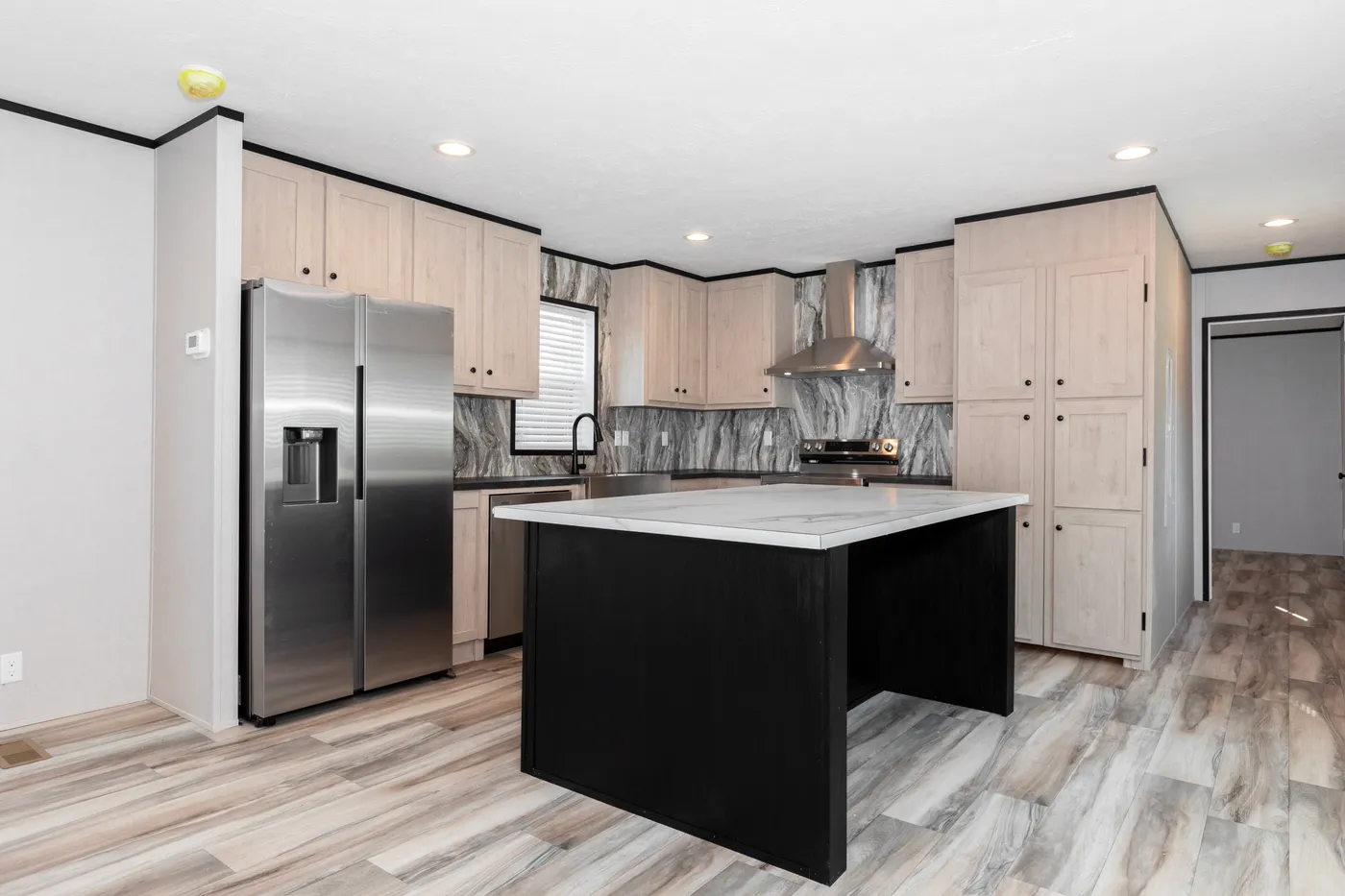 The THE FUJI Kitchen. This Manufactured Mobile Home features 3 bedrooms and 2 baths.