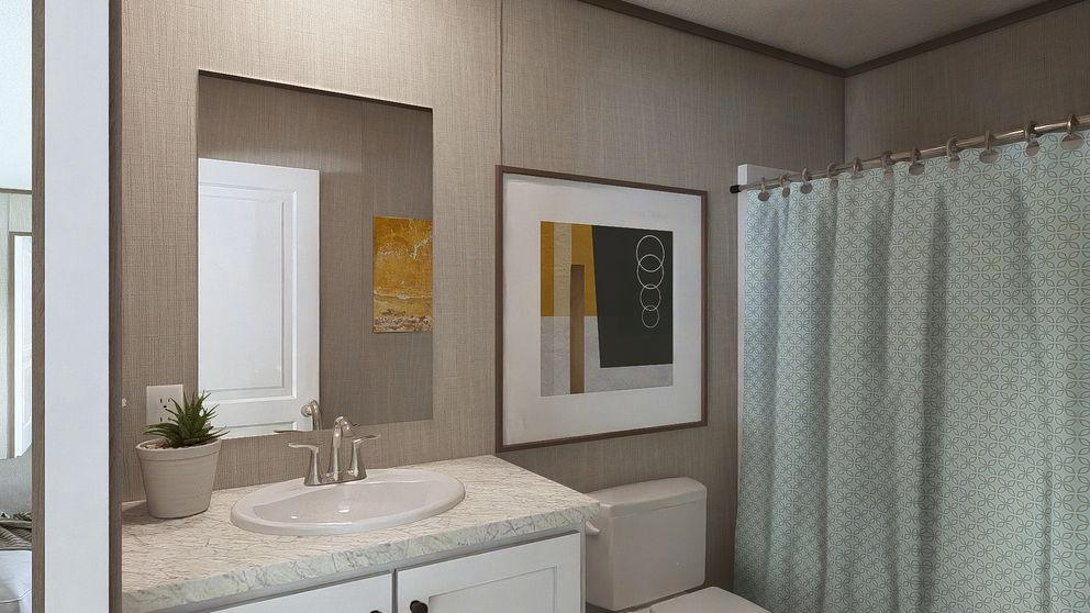 The LEGEND 28X48 Guest Bathroom. This Manufactured Mobile Home features 3 bedrooms and 2 baths.