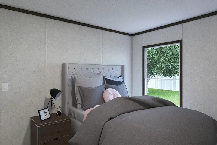 The OCCASION Guest Bedroom. This Manufactured Mobile Home features 4 bedrooms and 2 baths.