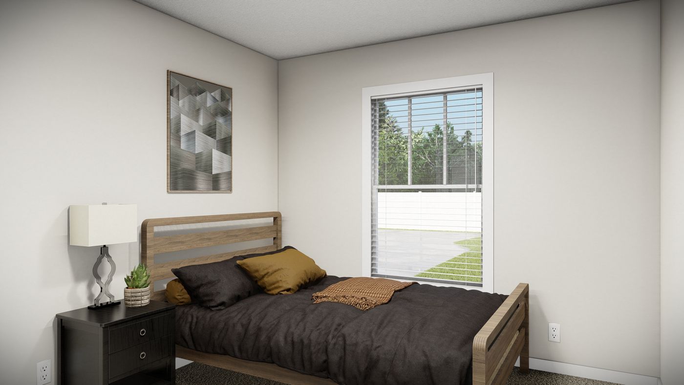 The TULIP BLVD/6028-MS047-1 SECT Bedroom. This Manufactured Mobile Home features 3 bedrooms and 2 baths.