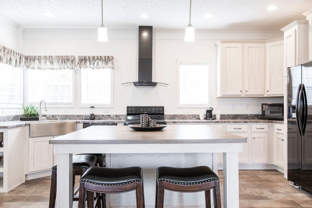 The 1558 JAMESTOWN Kitchen. This Manufactured Mobile Home features 3 bedrooms and 2 baths.