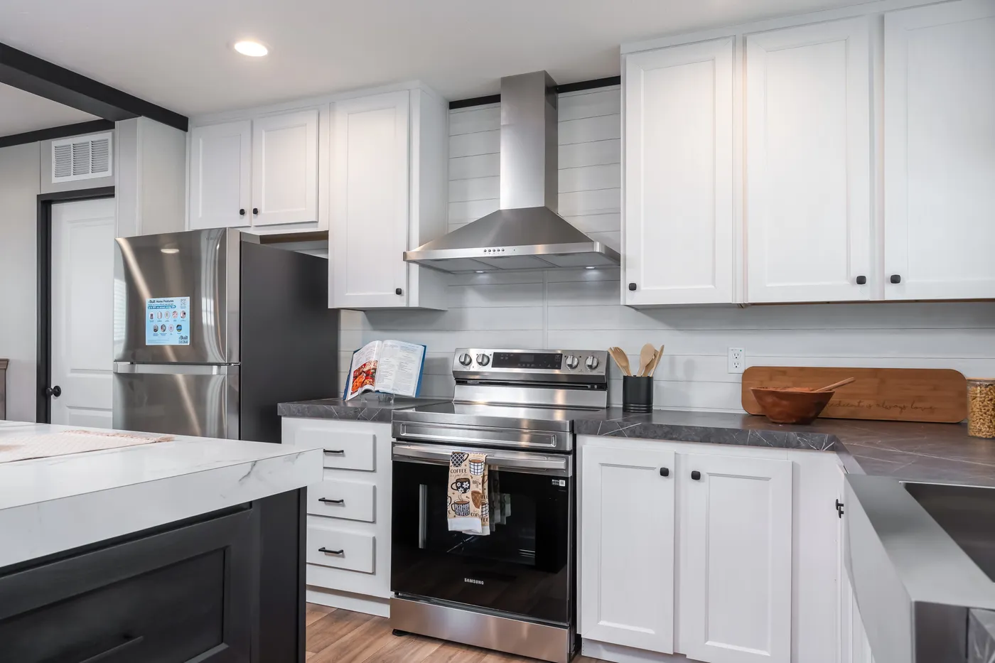 The ABSOLUTE VALUE Kitchen. This Manufactured Mobile Home features 4 bedrooms and 2 baths.