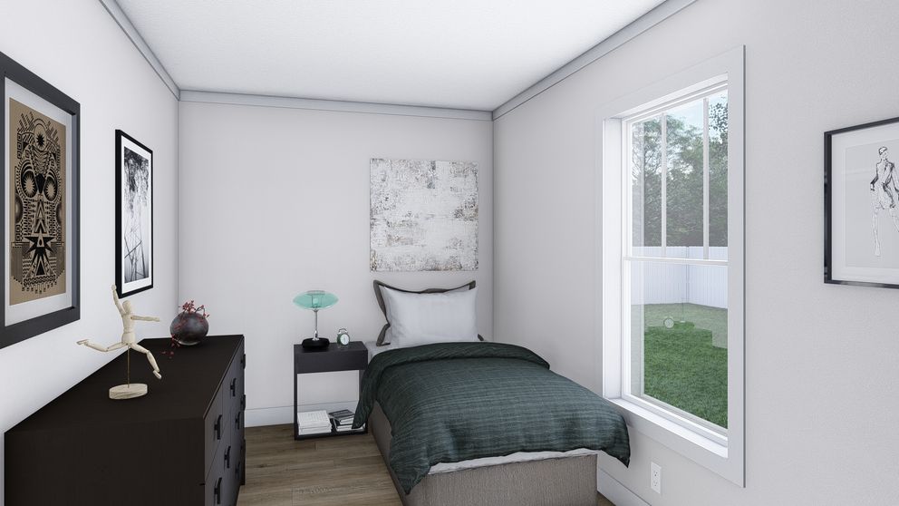 The STILL THE ONE Guest Bedroom. This Manufactured Mobile Home features 2 bedrooms and 2 baths.