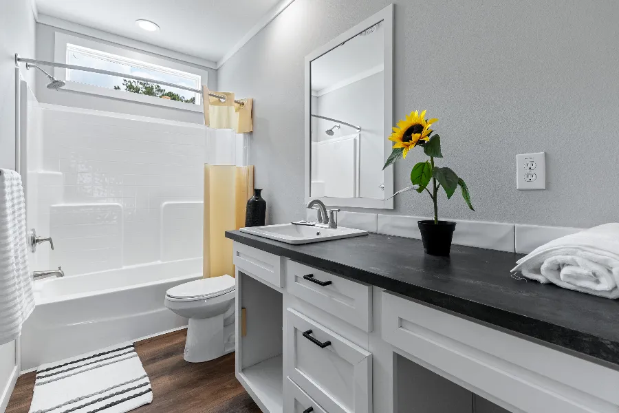 The THE SEDONA 4 Guest Bathroom. This Manufactured Mobile Home features 4 bedrooms and 2 baths.