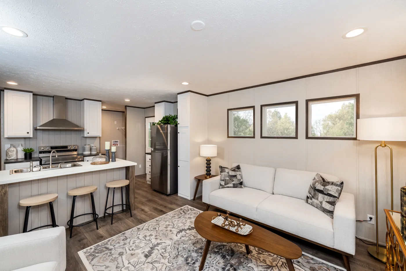 The INTUITION Living Room. This Manufactured Mobile Home features 3 bedrooms and 2 baths.