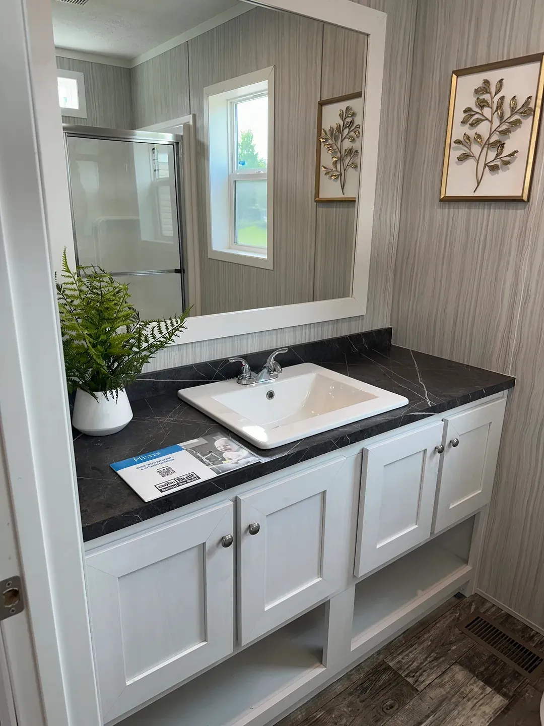 The TOPAZ Primary Bathroom. This Manufactured Mobile Home features 3 bedrooms and 2 baths.