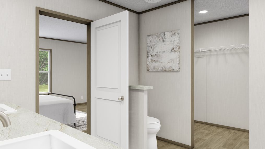 The MOROCCO Primary Bathroom. This Manufactured Mobile Home features 4 bedrooms and 2 baths.
