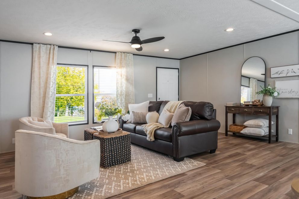 The ELEMENT Living Room. This Manufactured Mobile Home features 3 bedrooms and 2 baths.