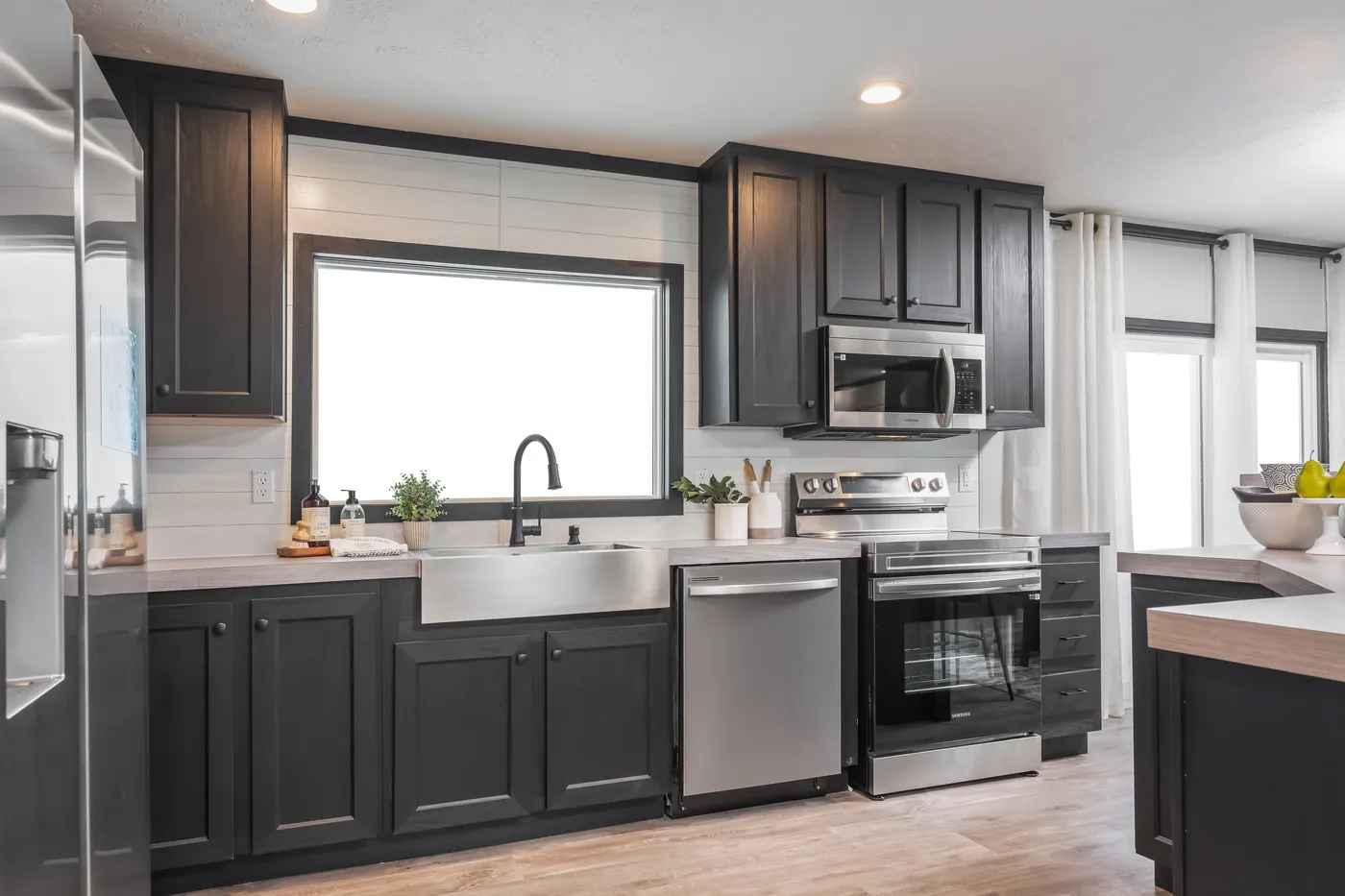 The CRAZY EIGHTS Kitchen. This Manufactured Mobile Home features 4 bedrooms and 2 baths.