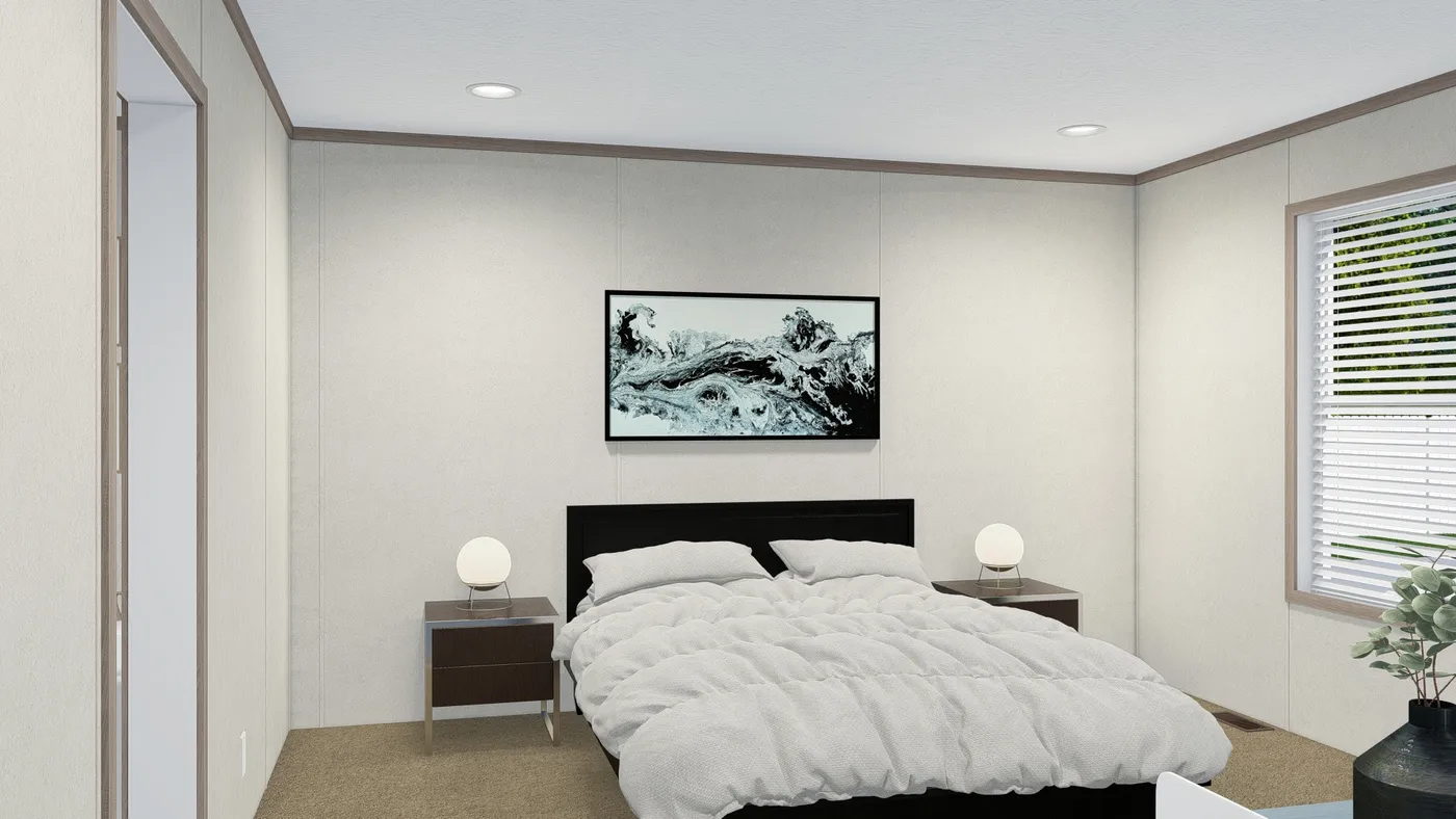The 7228-5789 THE PULSE Primary Bedroom. This Manufactured Mobile Home features 3 bedrooms and 2 baths.