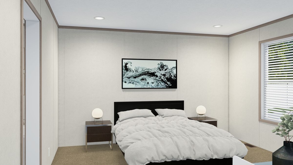 The 7228-5789 THE PULSE Primary Bedroom. This Manufactured Mobile Home features 3 bedrooms and 2 baths.