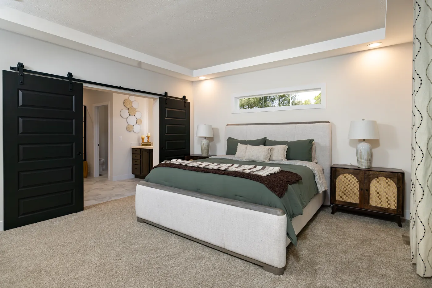 The MCCANN BLVD 6830-MS070 SECT Primary Bedroom. This Manufactured Mobile Home features 3 bedrooms and 2 baths.