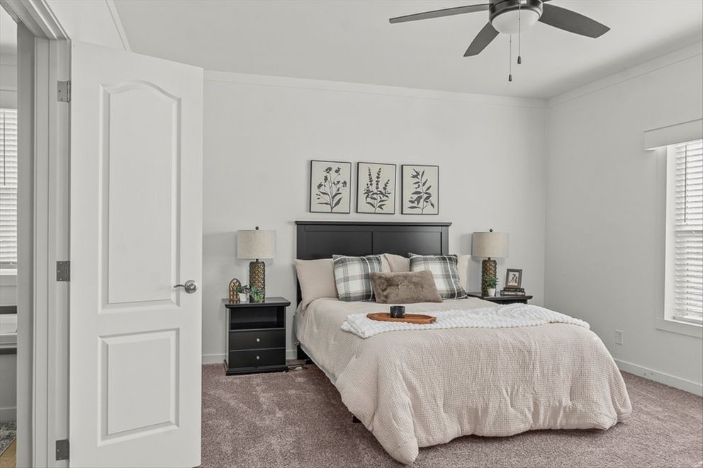 The TU3076A MEGA TUNDRA Primary Bedroom. This Manufactured Mobile Home features 4 bedrooms and 2 baths.