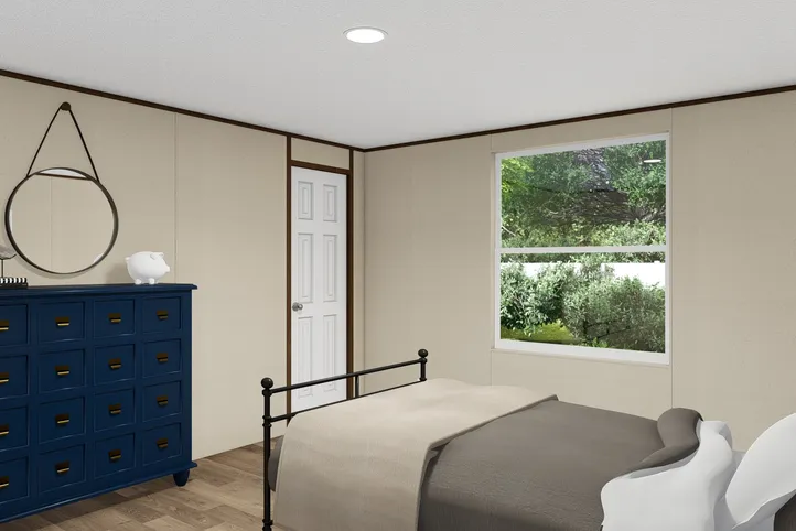 The TRIUMPH Bedroom. This Manufactured Mobile Home features 5 bedrooms and 3 baths.