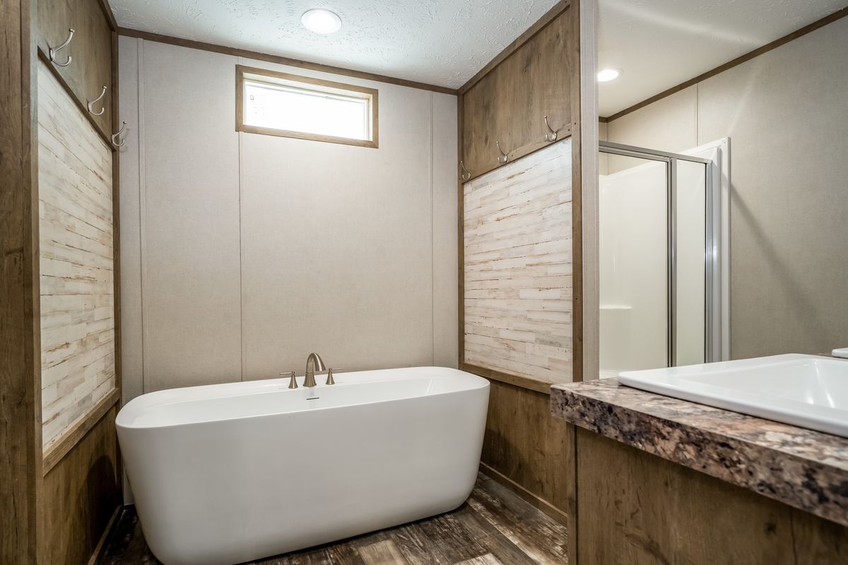 The ANNIVERSARY CHOICE Exterior. This Manufactured Mobile Home features 3 bedrooms and 2 baths.