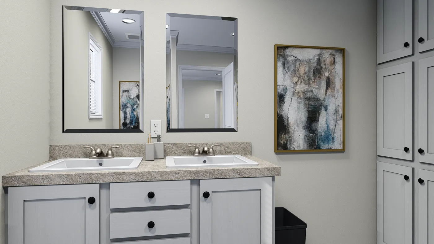 The 7010 "YADKIN" 7616 Primary Bathroom. This Manufactured Mobile Home features 3 bedrooms and 2 baths.