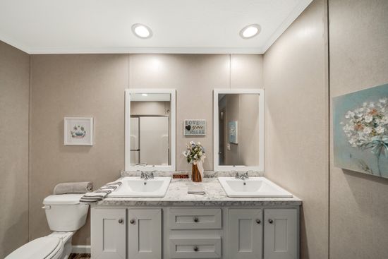 The SWEET BREEZE 76 Primary Bathroom. This Manufactured Mobile Home features 3 bedrooms and 2 baths.