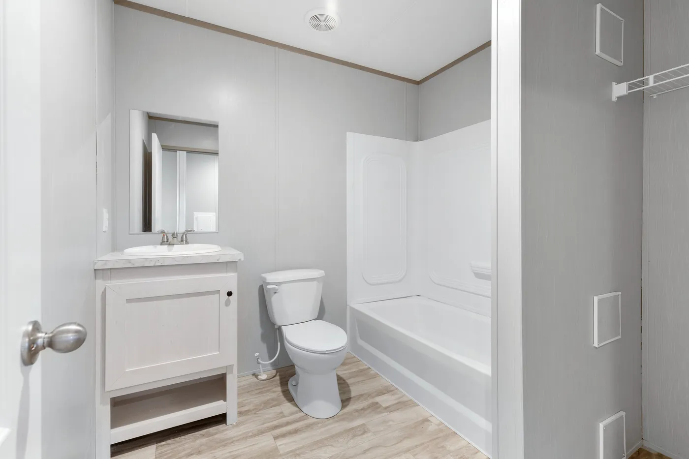 The BREEZE 16602A Guest Bathroom. This Manufactured Mobile Home features 2 bedrooms and 2 baths.