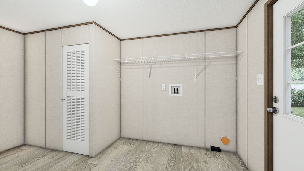 The TRIUMPH Utility Room. This Manufactured Mobile Home features 5 bedrooms and 3 baths.