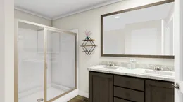 The RENEGADE 48A Primary Bathroom. This Manufactured Mobile Home features 3 bedrooms and 2 baths.