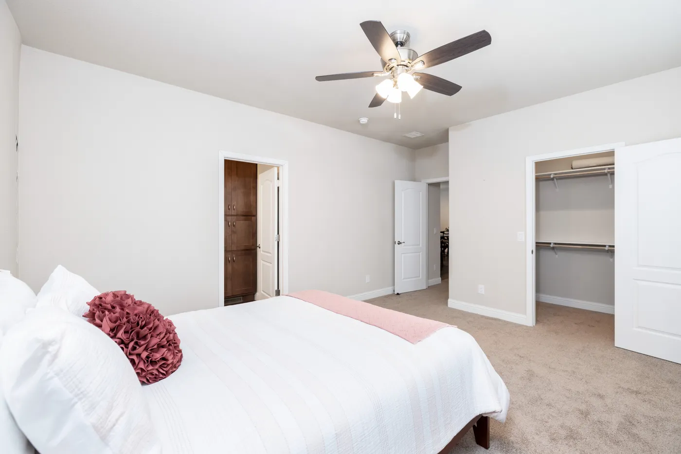 The FAIRPOINT 24523K Primary Bedroom. This Manufactured Mobile Home features 3 bedrooms and 2 baths.